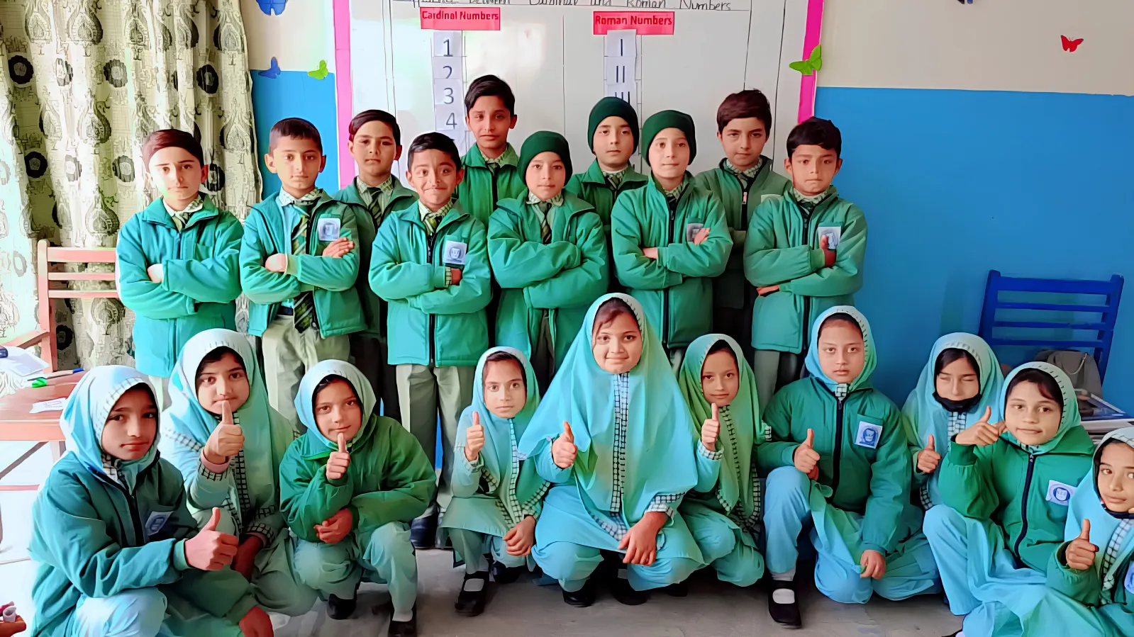 Students studying Quran and Science at Little Angels Education System Pakpattan